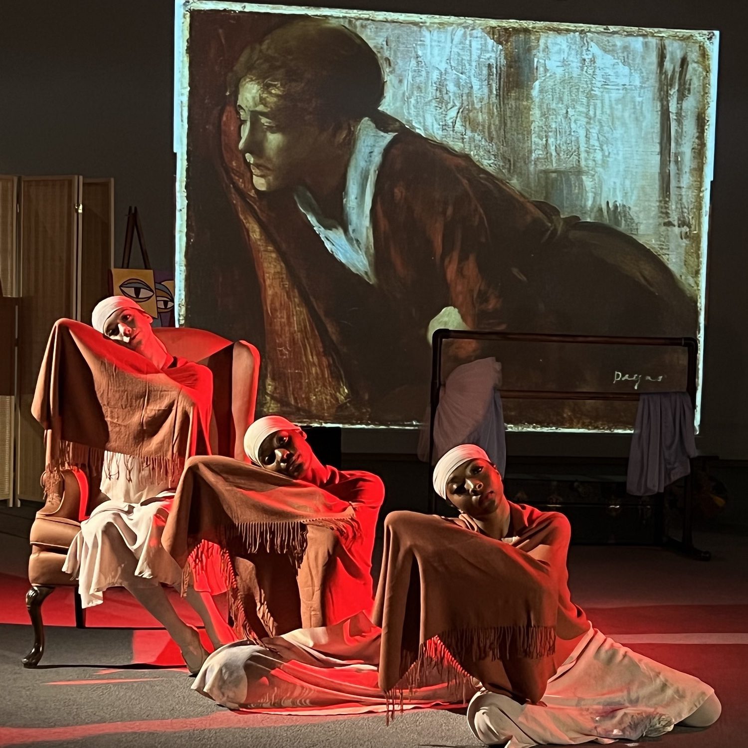 students posed on stage at the museum