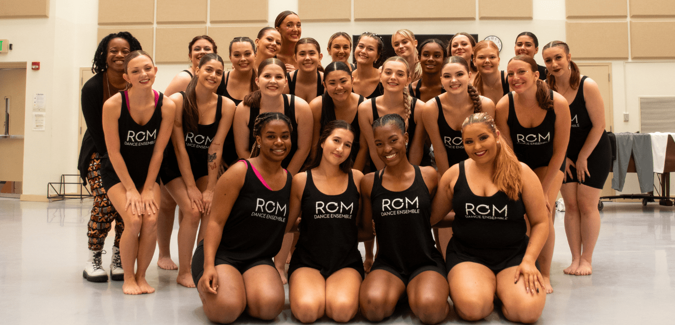 large group of dance students in a group photo before their showcase