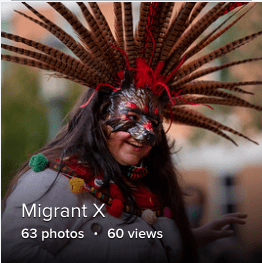 a student with a mask and elaborate head piece