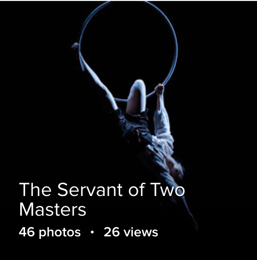 a female student hanging from an aerial hoop