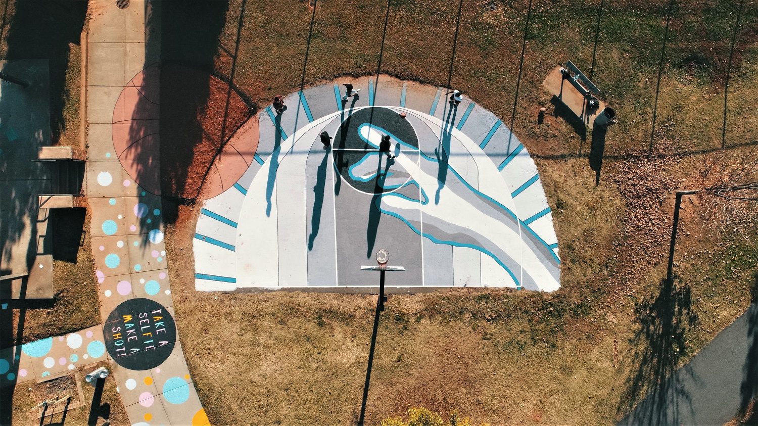 Drone view of black and white basketball mural