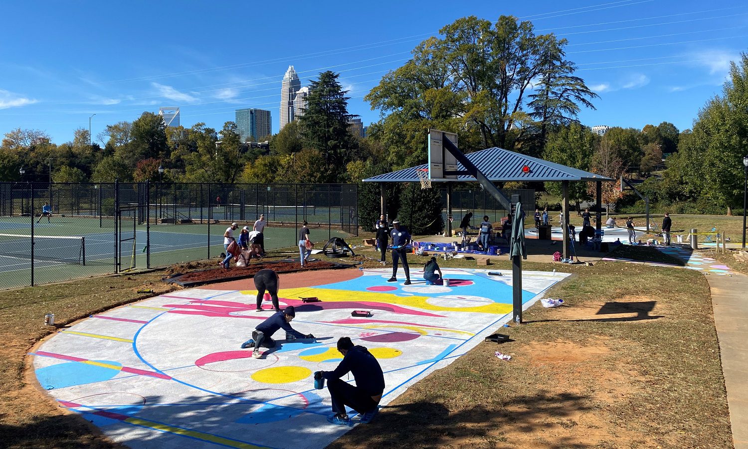 students painting mural