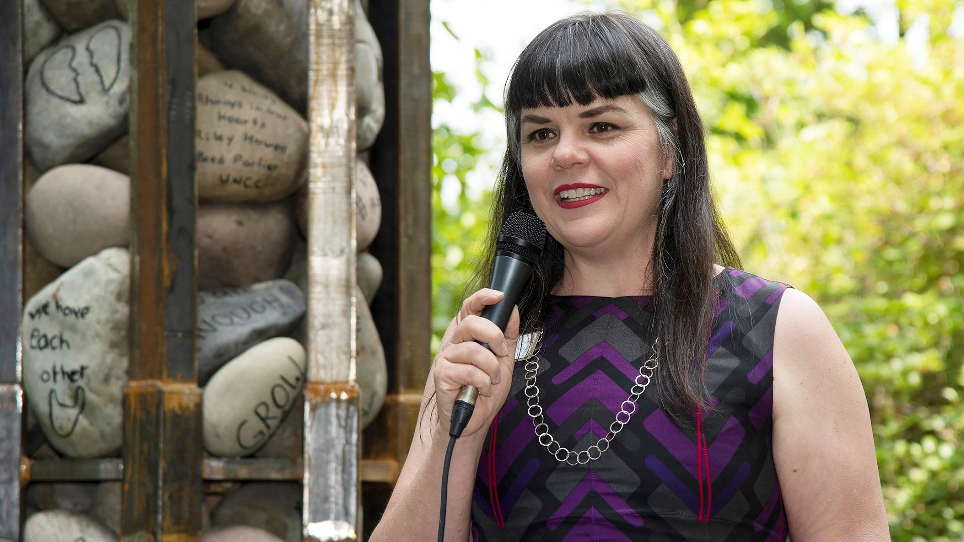 Amy Tipton at memorial sculpture
