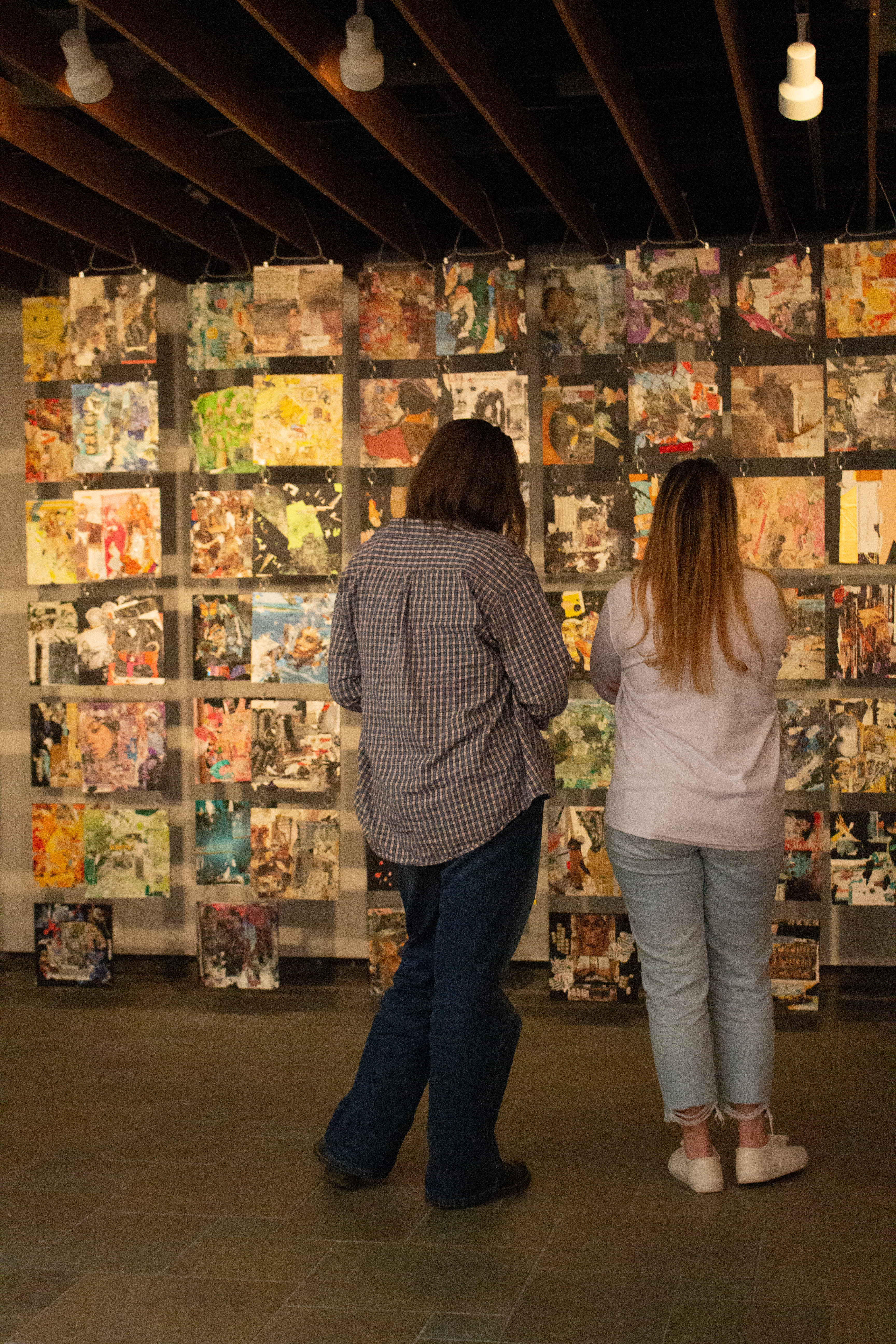 students looking at art in a gallery