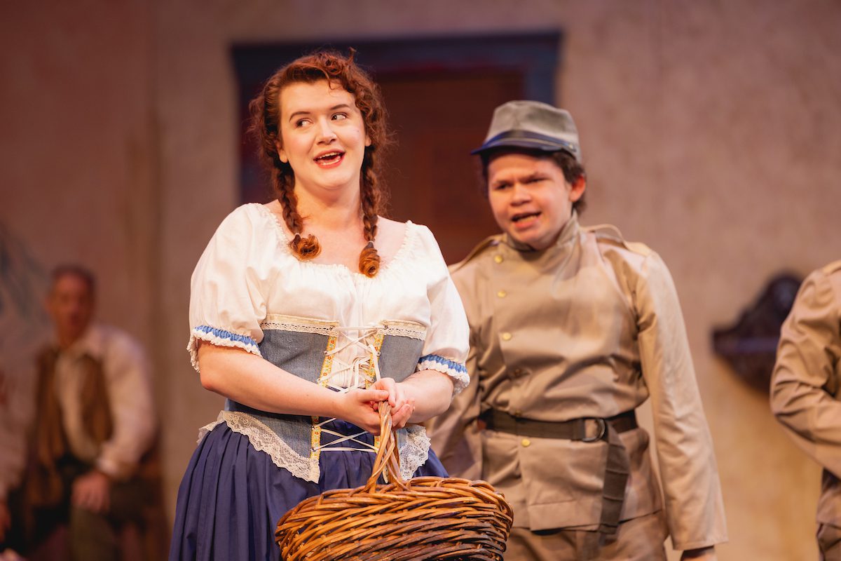 young woman singing in opera