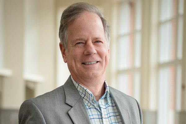 Dean Adams headshot in robinson hall